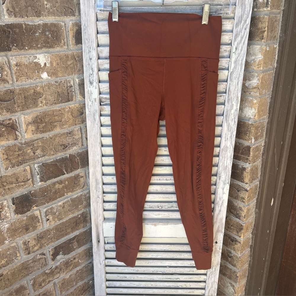 ATHLETA Women's  Salutation Stash Pocket II Cinch 7/8 Tight Legging XS Orange.